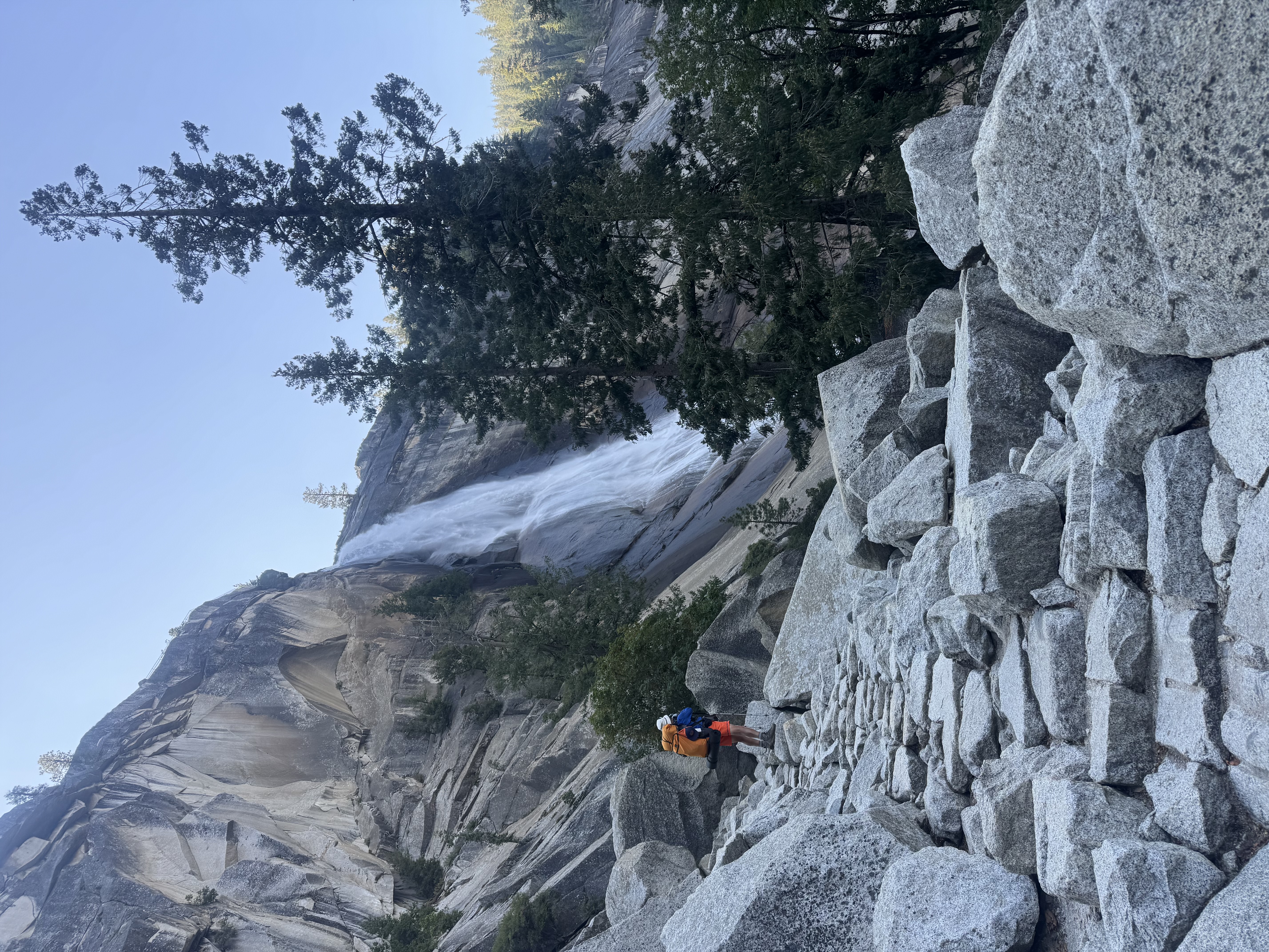 A hiker looking upon Nevada Falls