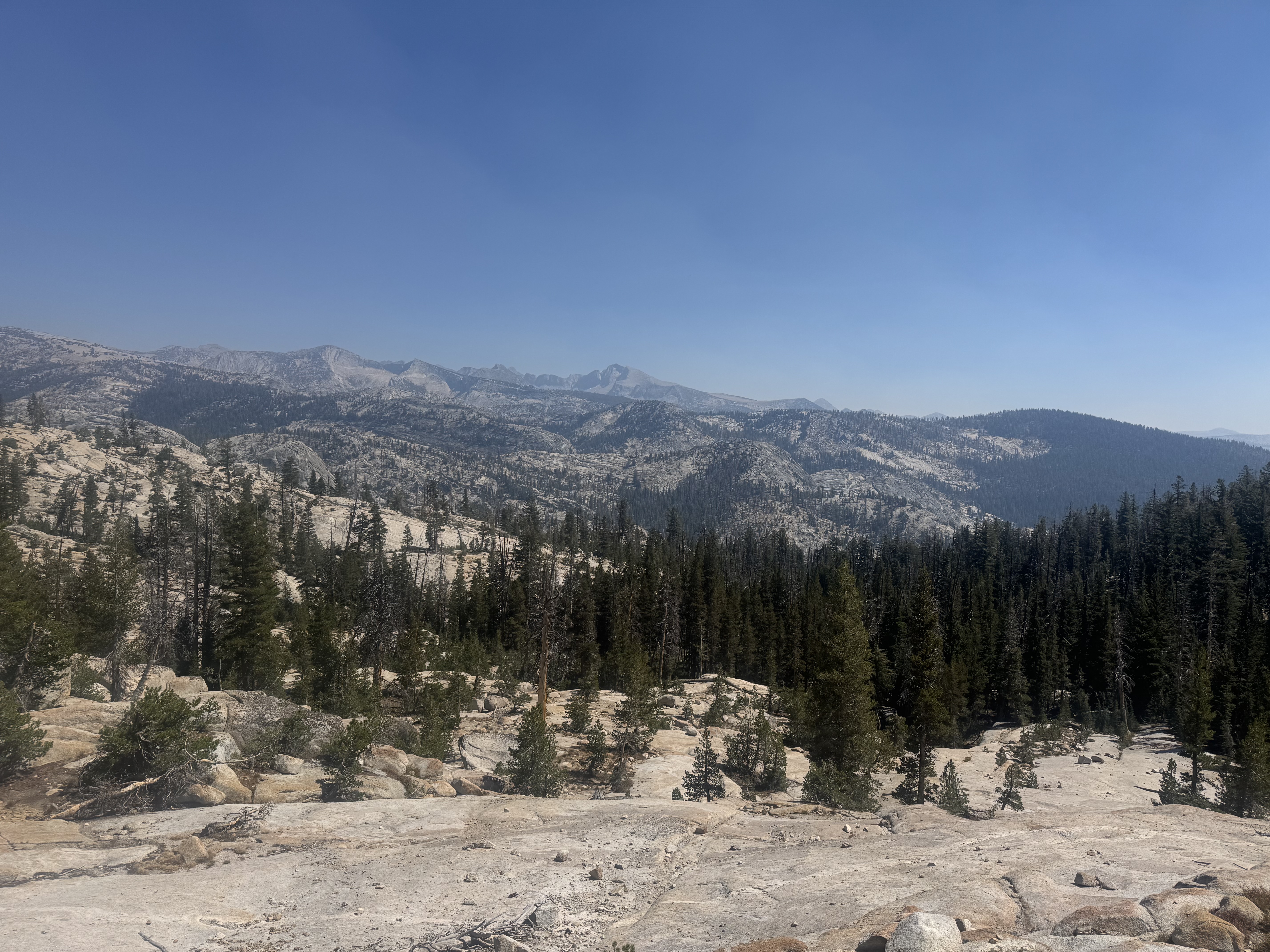High country view with smoke in distance